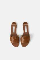 https://www.zara.com/uk/en/animal-print-leather-flat-sandals-p12600001.html?v1=19624531&v2=1281528